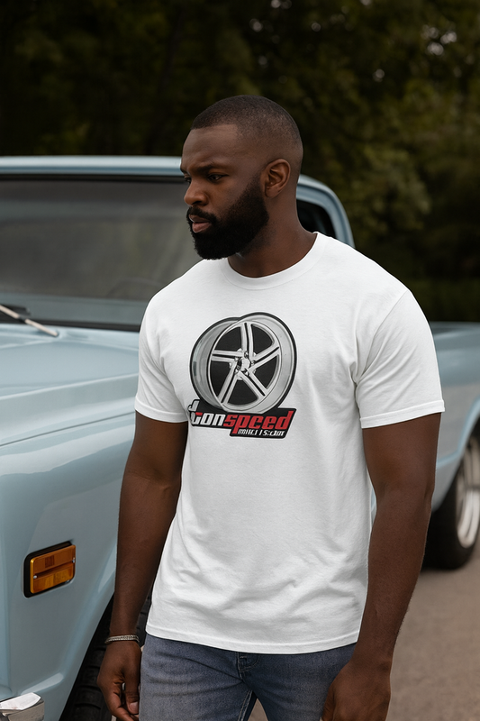 Man wearing a white bonspeed t-shirt with a logo in front of a classic car