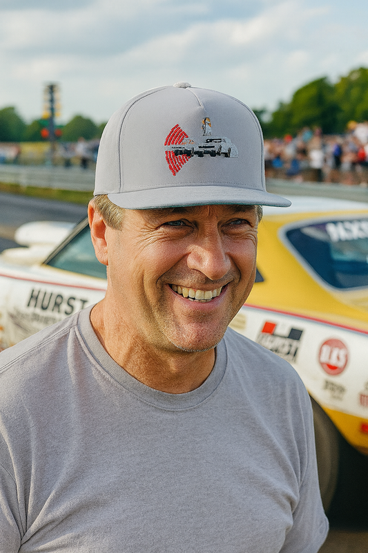 Man wearing a bonspeed cap with a logo in front of a Pro Stock Drag Car