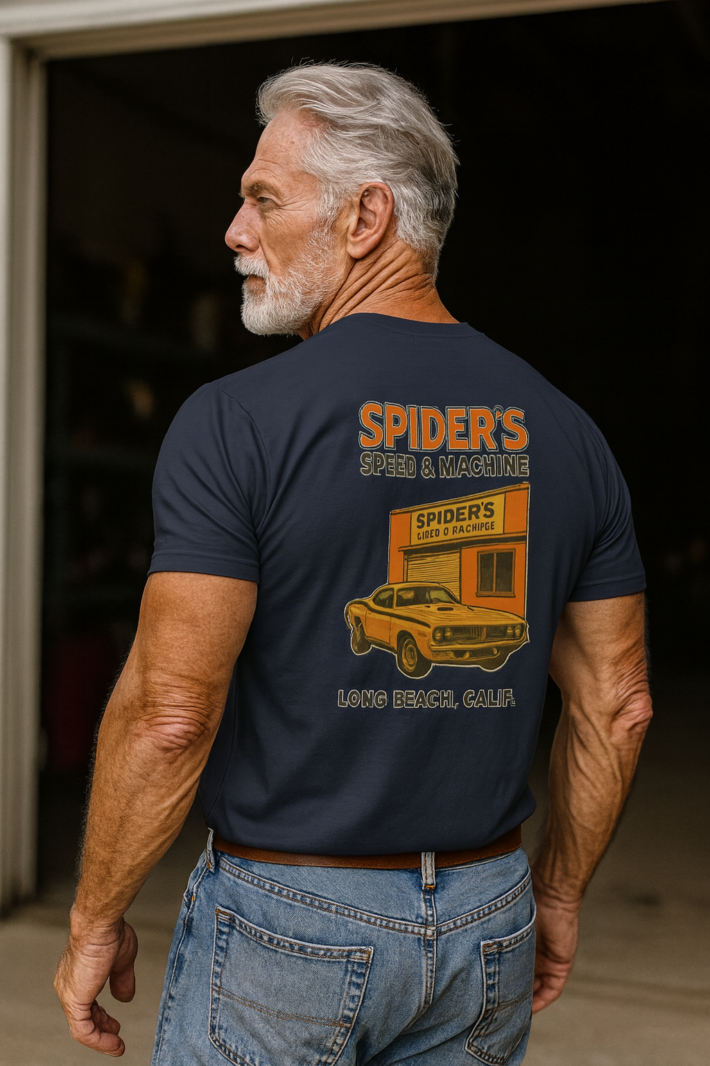 Man wearing a navy blue bonspeed t-shirt with a graphic Spiders Speed & Machine